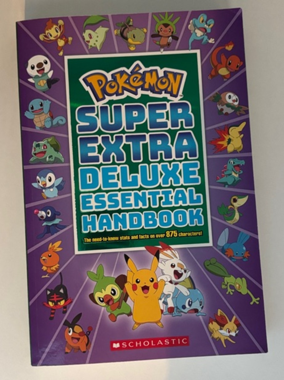 Scholastic Pokémon Super Extra Deluxe Essential Handbook - Purple & Teal